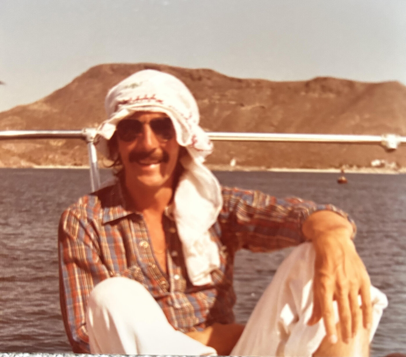 Joseph on a boat in Baja, Mexico