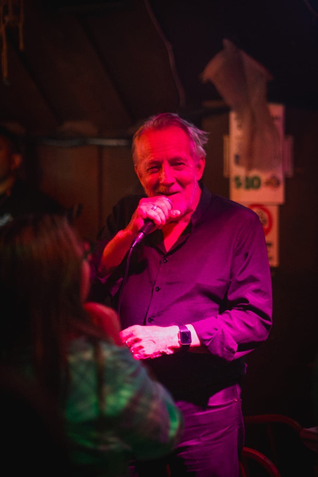 Joseph singing under stage lights